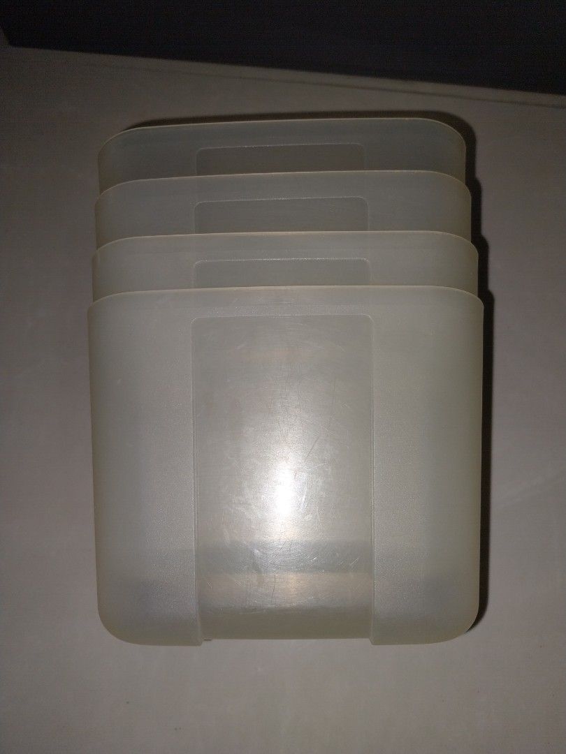 Tupperware containers (Category: Food Organisation & Storage) located in Singapore. Submitted by dsladybird (Listing ID 1410131230, Image 1). Description: 4 containers without covers. 2 x 1L and 2 x 700ml. Not for fussy buyers. Self collect at Blk 113 Tao Ching Road pick up area (see pic) or Nearby bus stops: Bus: 30, 98, 98M, 240, 246 Bus stop no: 21581, Blk 65 : 21589, OppBlk 65 Bus: 49, 154 Bus stop no: 21631, Blk 115/ opp Japanese Garden 2163