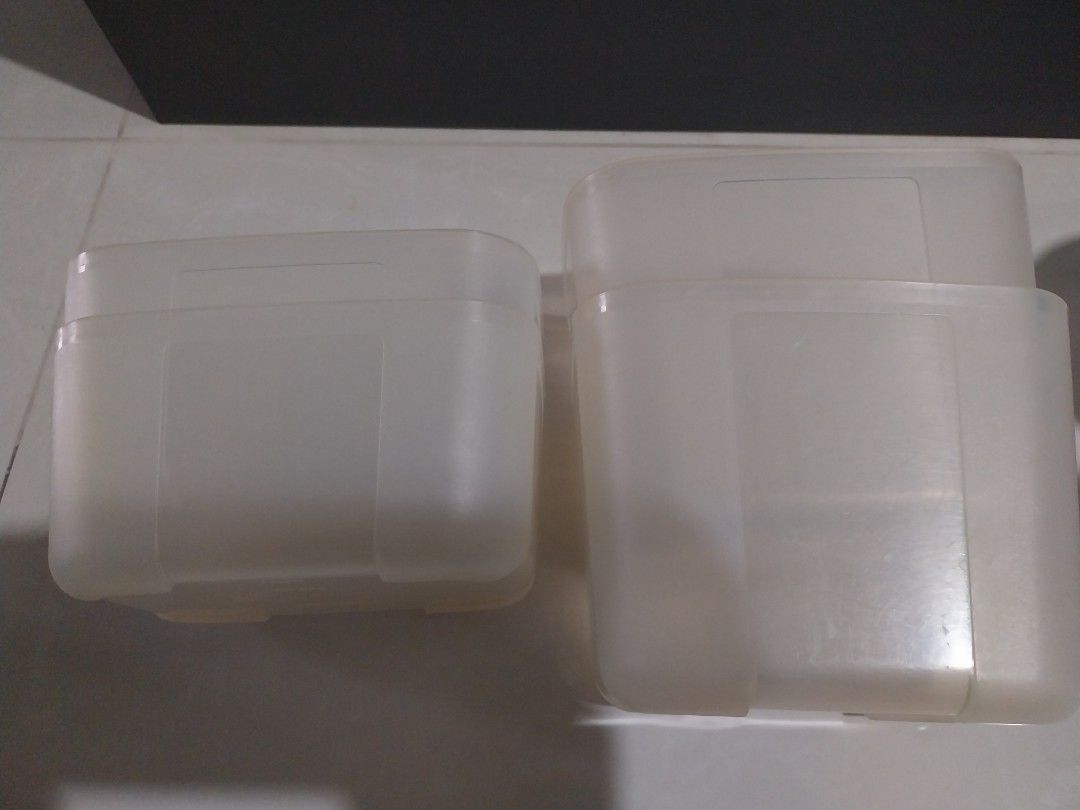 Tupperware containers (Category: Food Organisation & Storage) located in Singapore. Submitted by dsladybird (Listing ID 1410131230, Image 2). Description: 4 containers without covers. 2 x 1L and 2 x 700ml. Not for fussy buyers. Self collect at Blk 113 Tao Ching Road pick up area (see pic) or Nearby bus stops: Bus: 30, 98, 98M, 240, 246 Bus stop no: 21581, Blk 65 : 21589, OppBlk 65 Bus: 49, 154 Bus stop no: 21631, Blk 115/ opp Japanese Garden 2163