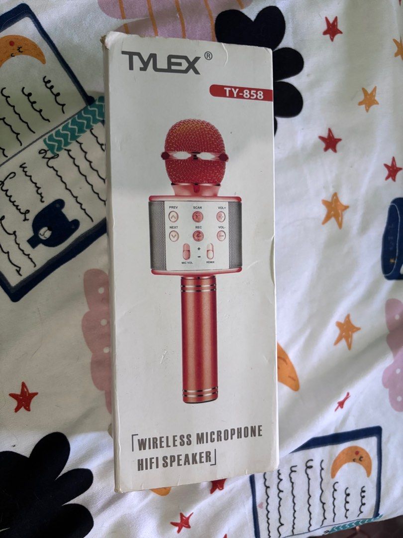 Tylex TY-858 Wireless Microphone (Category: Microphones) located in Rizal. Submitted by youronlineshoppe (Listing ID 1410061157, Image 3). Description: Tylex TY-858 wireless microphone is a HiFi speaker. It has a rose gold finish and includes a charging cable. The microphone has several control buttons for functions like volume, next, previous, and remix. It comes in its original box..