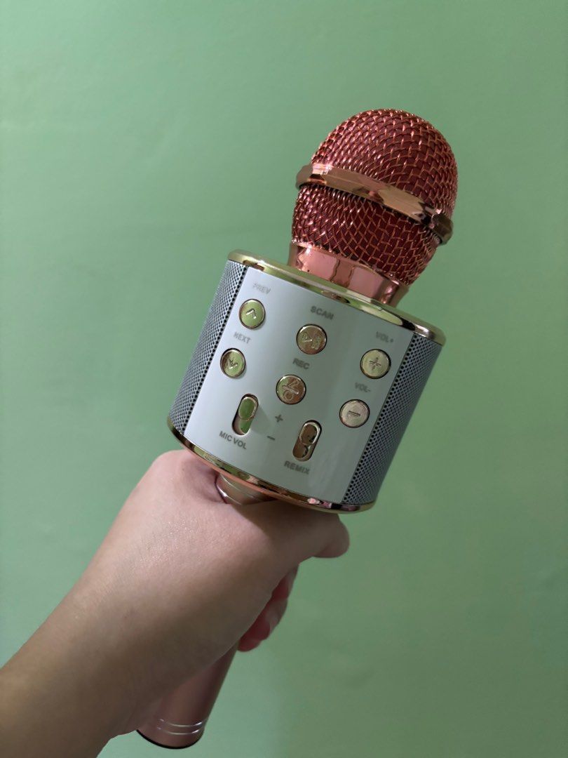 Tylex TY-858 Wireless Microphone (Category: Microphones) located in Rizal. Submitted by youronlineshoppe (Listing ID 1410061157, Image 1). Description: Tylex TY-858 wireless microphone is a HiFi speaker. It has a rose gold finish and includes a charging cable. The microphone has several control buttons for functions like volume, next, previous, and remix. It comes in its original box..