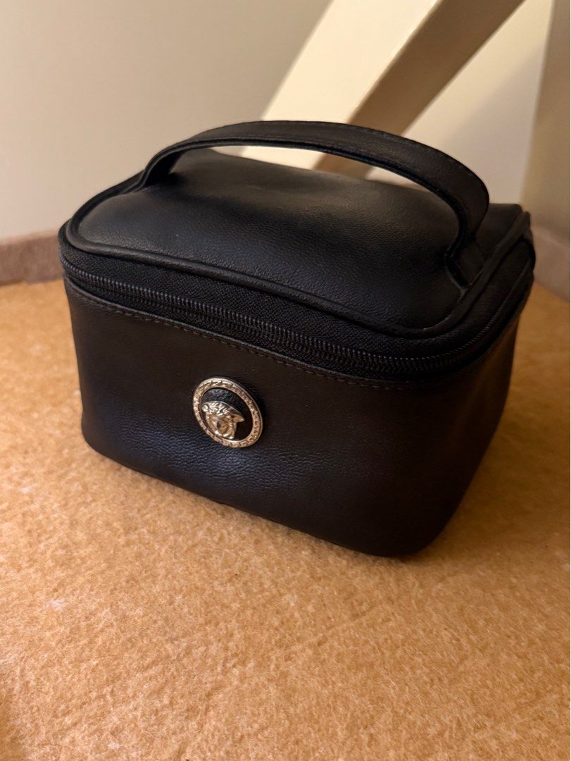 Versace Mini Vintage Cosmetic Bag (Category: Luxury Bags & Wallets) located in Mandaluyong City. Submitted by mybellashop (Listing ID 1410151111, Image 1). Description: • Brand: Versace • Item: Vintage Leather Cosmetic Bag • Color: Black • Condition: Like new ‼️Size comparison to IP16PM‼️ 📍 Mandaluyong City (MOP): GCash / BDO or COD (MOD): J&T, Lalamove, etc..