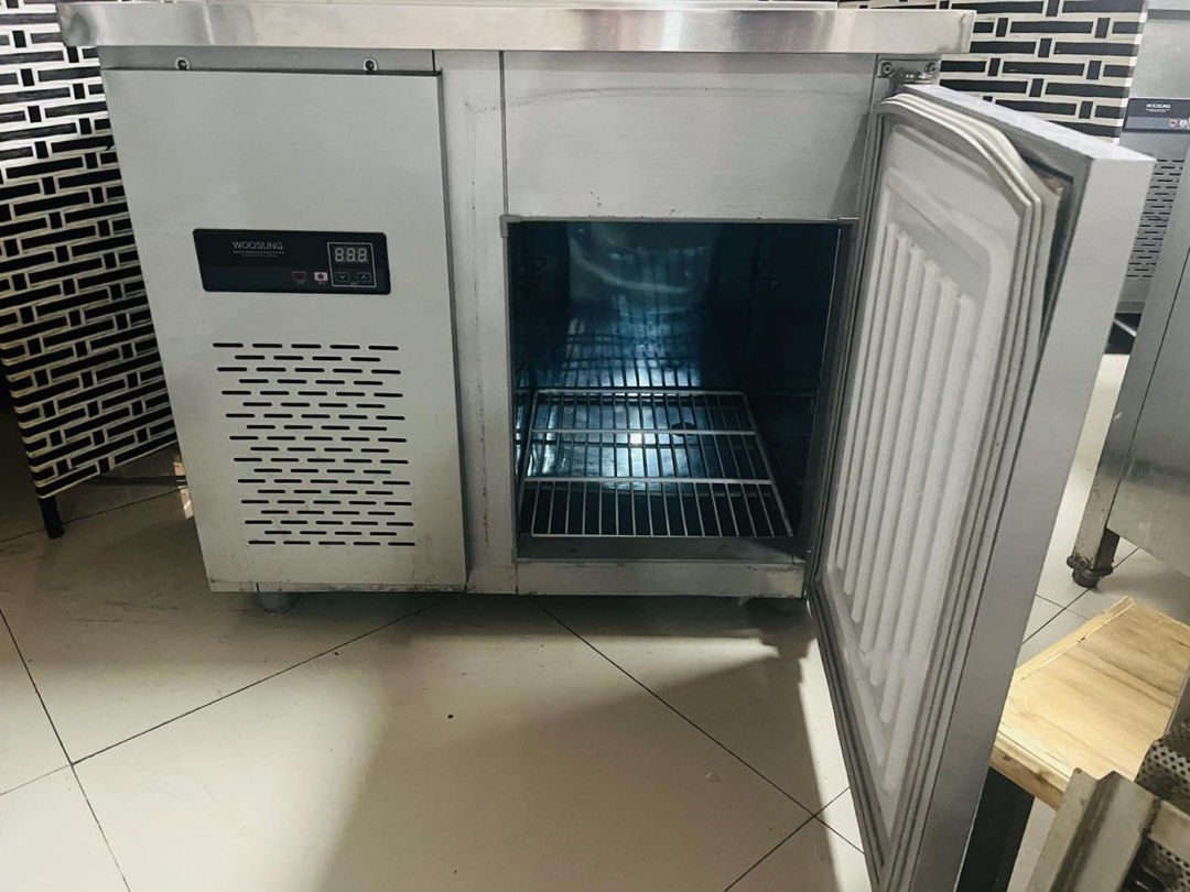 Woosung Commercial under counter chiller (Category: Refrigerators and Freezers) located in Paranaque City. Submitted by patrickph31 (Listing ID 1410025817, Image 1). Description: - Woosung commercial under counter chiller - Stainless steel exterior and interior - Digital temperature display - Ideal for restaurants and food businesses - In good working condition.