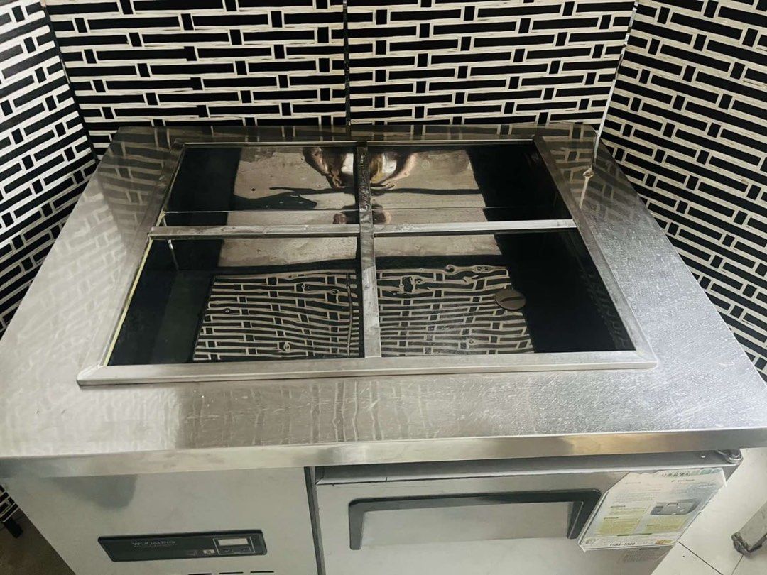 Woosung Commercial under counter chiller (Category: Refrigerators and Freezers) located in Paranaque City. Submitted by patrickph31 (Listing ID 1410025817, Image 2). Description: - Woosung commercial under counter chiller - Stainless steel exterior and interior - Digital temperature display - Ideal for restaurants and food businesses - In good working condition.