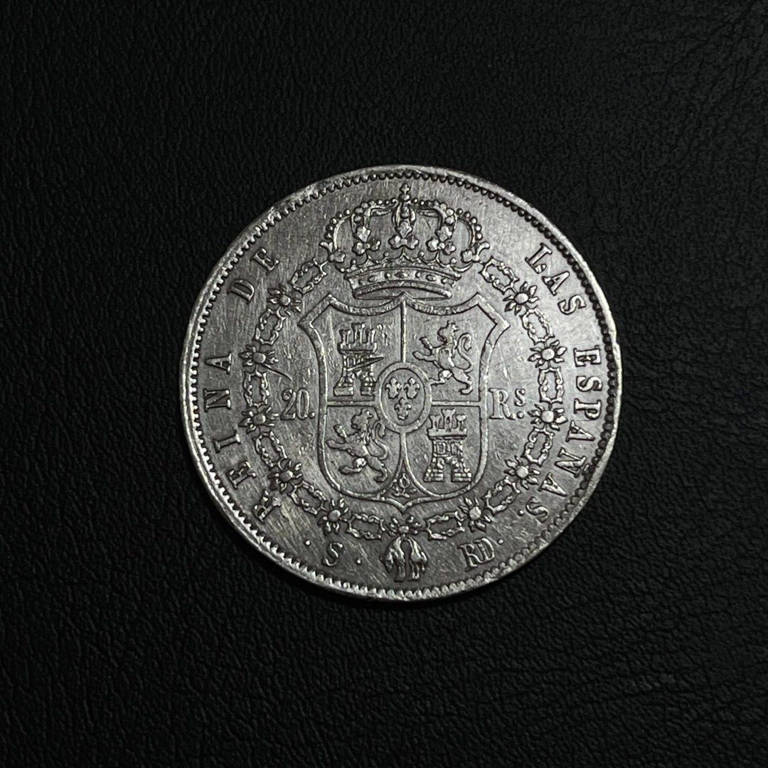 RARE 1850 20 Reales Isabel Silver (Category: Currency) located in Manila. Submitted by banene_poteto (Listing ID 1410203347, Image 2). Description: As is where is. Nice catalogue value for this coin. You can request more pictures. Pm if interested. .