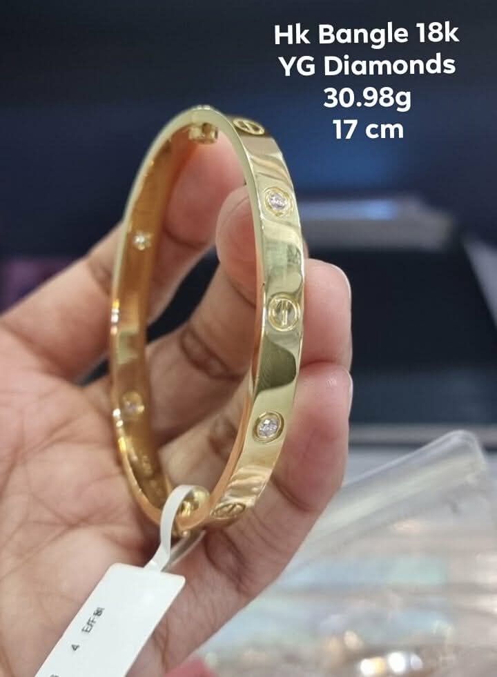 18K HK SETTING YG LOVE BANGLE WITH DIAMOND (Category: Bracelets) located in Cavite. Submitted by vmccollection24 (Listing ID 1410265900, Image 1). Description: WE SHIP INTERNATIONAL/NATIONWIDE🚛✈️ CASH/LAYAWAY ACCEPTED! 💎 Invest your money wisely 💎 Habang tumatagal tumataas ang value 💎 Genuine,Pawnable/Nasasanla 💎BRANDNEW 💎 Cheaper than mall price!!! 💎 High Appraisal Value 💎 Good Investment 💎 Easy Liquidity 💎 Money Back quaranteed if pro