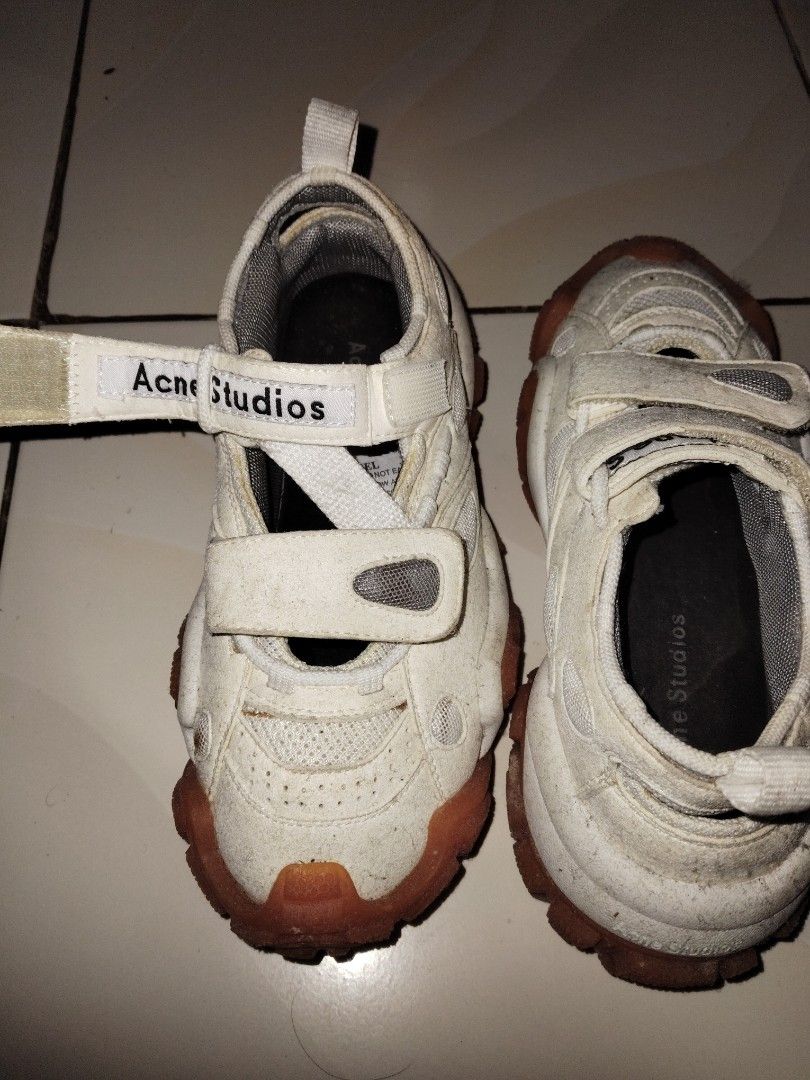 Acne Studios White Sneakers (Category: Sneakers) located in Batangas. Submitted by kasualcornerph (Listing ID 1410274097, Image 3). Description: - Acne Studios sneakers - Size 38 - Orange soles - Two velcro straps - Made in China Reason for selling need funds for emergency feel free to message me for more information..