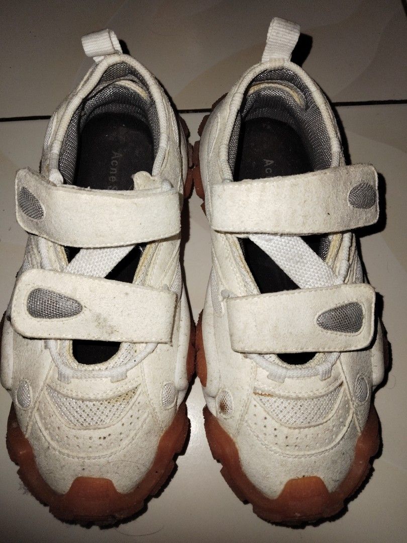 Acne Studios White Sneakers (Category: Sneakers) located in Batangas. Submitted by kasualcornerph (Listing ID 1410274097, Image 1). Description: - Acne Studios sneakers - Size 38 - Orange soles - Two velcro straps - Made in China Reason for selling need funds for emergency feel free to message me for more information..