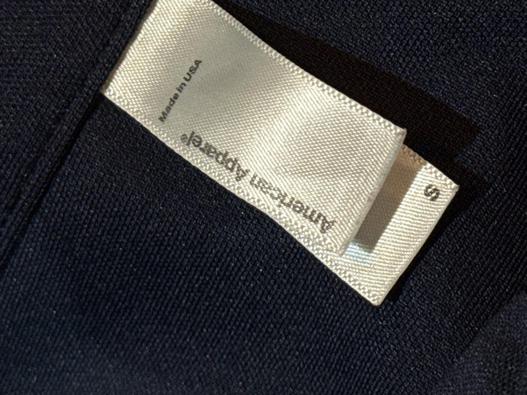 American Apparel Navy Wrap Skirt (Category: Skirts) located in San Fernando. Submitted by miso.ph (Listing ID 1410307735, Image 3). Description: American Apparel Wrap Navy Skirt wrap-style design with two buttons. size S fits waist 26" jersey material Made in USA issue: small sewn part at the back of waist band .