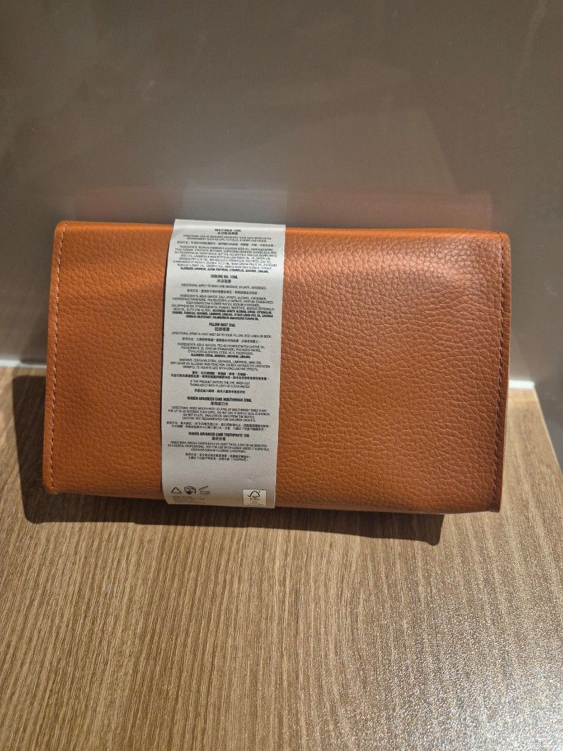 Bamford x Cathay Pacific Travel Kit (Category: Face Care) located in San Juan City. Submitted by apetitegirl (Listing ID 1410344582, Image 3). Description: - Bamford travel kit with a stylish leather case. - Available in orange and beige. - orange is sealed, beige was opened but unused - Includes essential toiletries: toothbrush, toothpaste, earplugs, and more. - Features the Bamford logo. - Ideal for travel. - from Cathay pacific business class.