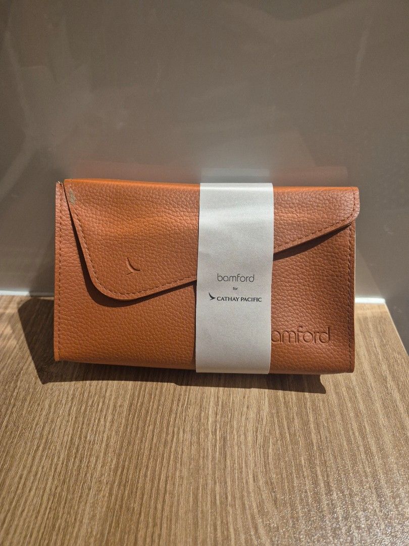 Bamford x Cathay Pacific Travel Kit (Category: Face Care) located in San Juan City. Submitted by apetitegirl (Listing ID 1410344582, Image 2). Description: - Bamford travel kit with a stylish leather case. - Available in orange and beige. - orange is sealed, beige was opened but unused - Includes essential toiletries: toothbrush, toothpaste, earplugs, and more. - Features the Bamford logo. - Ideal for travel. - from Cathay pacific business class.