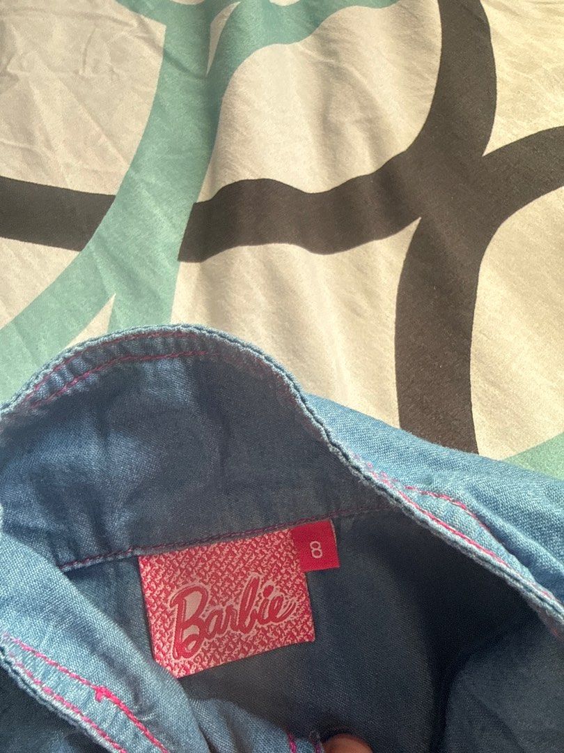 Barbie Denim Vest - Size 8 (Category: Babies & Kids Fashion) located in Bacoor. Submitted by rizza_455 (Listing ID 1410190233, Image 2). Description: - Denim vest - Pink stitching and buttons - Size 8 - Barbie tag - Sleeveless - Two front pockets - Collar fit to 4-6 yrs old.