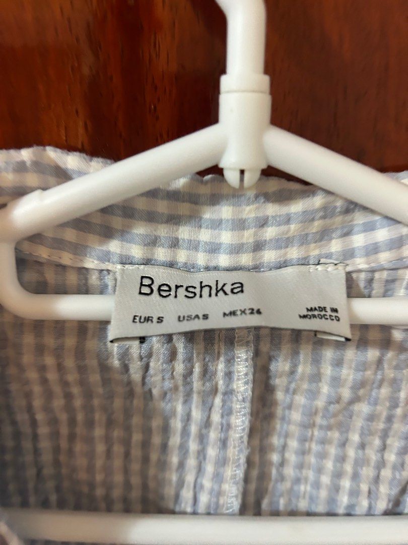 Bershka Gingham Shirt (Category: Blouses) located in Quezon City. Submitted by st5ff (Listing ID 1410253968, Image 2). Description: - Bershka shirt - Blue and white gingham pattern - Short sleeves - Collared neckline - Button-down closure - Size: S -.