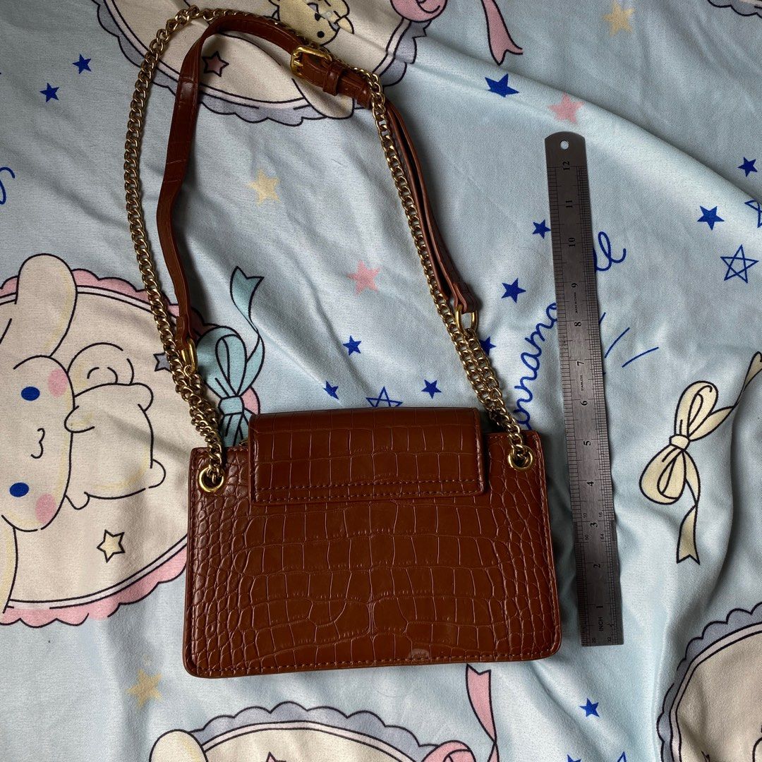 Brown Crocodile-Embossed Chain Bag Shoulder Messenger (Category: Cross-body Bags) located in Taguig. Submitted by anndefined (Listing ID 1410194486, Image 2). Description: - has flaws, pls refer to photos - free when you buy an item from me.