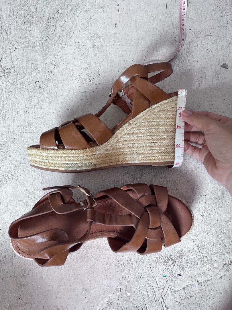 Brown Wedge Sandals (Category: Flats & Sandals) located in Bulacan. Submitted by handlewithcaution (Listing ID 1410309590, Image 3). Description: Brown Wedge Sandals Size 35/ 22cm Preloved, may minimal flaw not noticeable. No brand but the quality 10/10. Video call accepted but for sure buyer only. Location: Tanza Cavite.