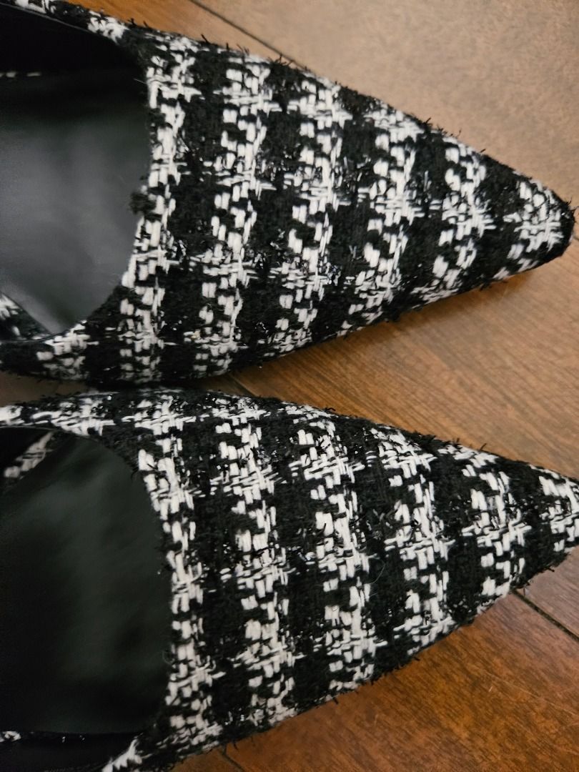 Charles & Keith Tweed Heels size 41 with box (Category: Heels) located in Pasig City. Submitted by agrvnt24 (Listing ID 1410190973, Image 3). Description: Elegant Charles & Keith heels in a black and white tweed pattern. Features a pointed toe design with a strap and buckle closure. The heels have a unique silver accent. Perfect for adding a touch of sophistication to any outfit. Never been used. I was supposed to wear it but did not fit my outif