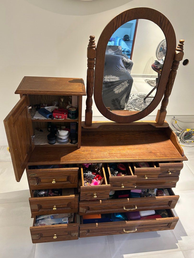 Dressing Table (Solid Wood) (Category: Other Home Furniture) located in Singapore. Submitted by omerta333 (Listing ID 1410308307, Image 2). Description: Solid wood. I dont know what kind of wood it is. But its heavy and sturdy. Comes with 12 compartments. Still in good working condition. Collection will be at Pasir ris west. Arrange your own driver/lalamove. Or i can arrange for you for a fee. Selling it for $300. Willing to negotiate. But please