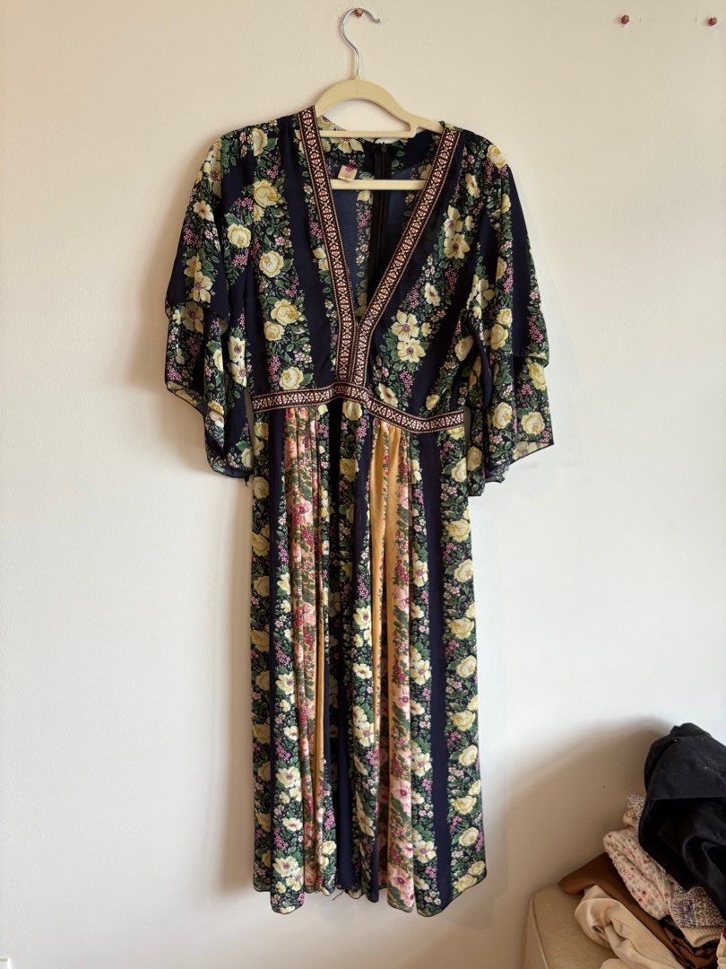 Floral Print Maxi Dress (Category: Dresses) located in Pasig City. Submitted by jamcy31 (Listing ID 1410252205, Image 1). Description: - Floral print maxi dress - V-neck design - Flowing sleeves - Fitted waist - Long, flowing skirt - Mixed floral and stripe patterns - Lightweight fabric.