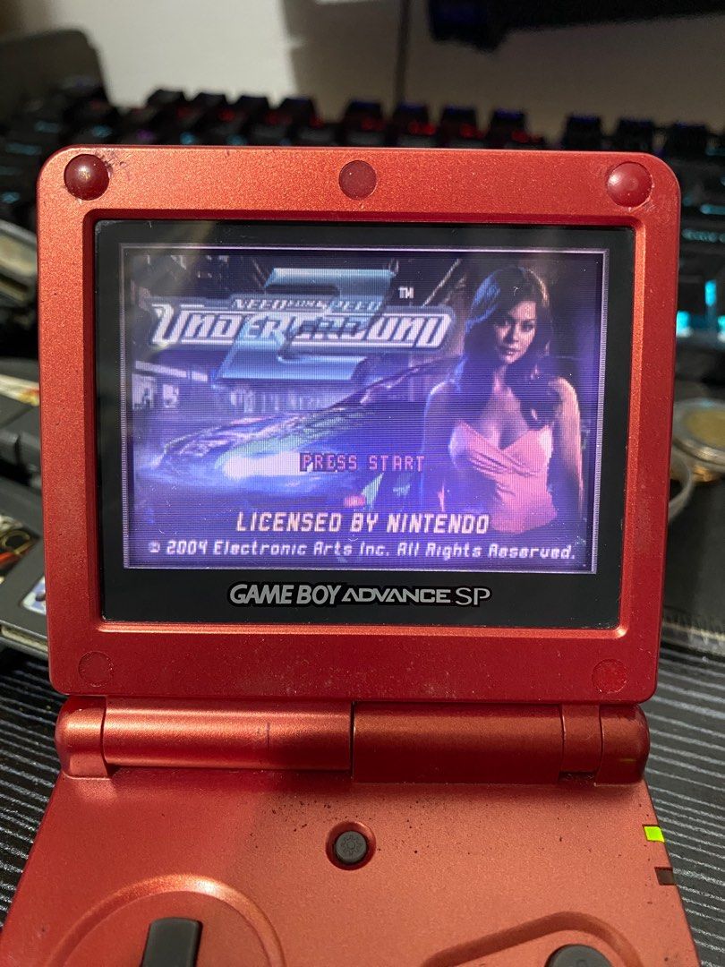 Game Boy Advance SP - Need for Speed Underground 2 Cartridge (Category: Nintendo) located in Manila. Submitted by ianbrent (Listing ID 1410323049, Image 1). Description: - Red Game Boy Advance SP - Screen displays Need for Speed Underground - Licensed by Nintendo - Game from 2004 by Electronic Arts Inc. - Console in working condition - No Nintendo markings inside.