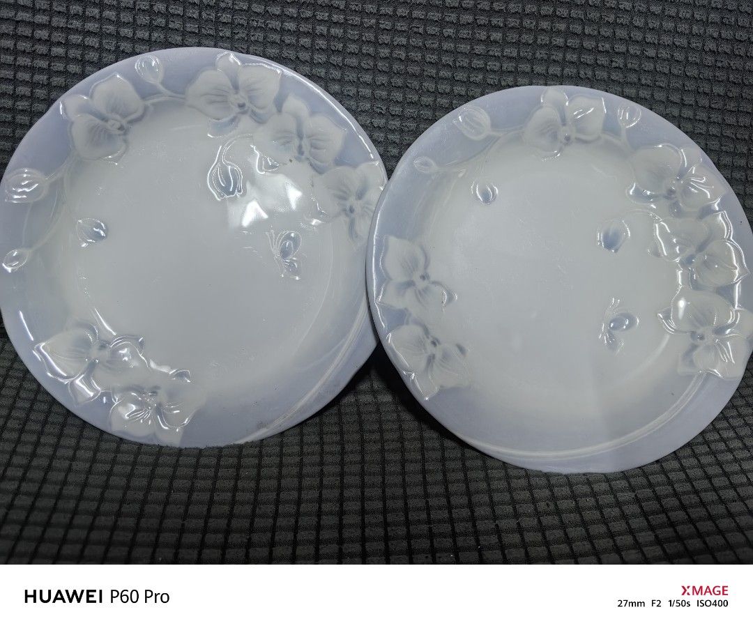 Hanae Mori Dinnerware Plates (Category: Dinnerware & Cutlery) located in Rizal. Submitted by gkstcenit (Listing ID 1410249844, Image 1). Description: - Set of two Hanae Mori dinner plates - Features a delicate floral design - Subtle blue hue - Marked with Hanae Mori logo and "Japan" - Approximately 15cm in diameter.