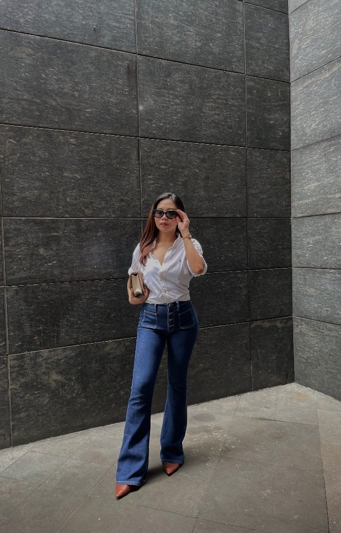 High-Waisted Flare Jeans (Category: Jeans) located in Pasig City. Submitted by alwaysfaevored (Listing ID 1410246716, Image 2). Description: - High-waisted flare jeans - Dark wash - Button-up front pocket design - Classic five-pocket style - Flared leg opening - Creates a flattering silhouette - Versatile and chic SWEAR TO GOSH, LAKAS MAKA OLD RICH VIBEEEE 💅✨ Di na kasi kasya sakinnnn :(.