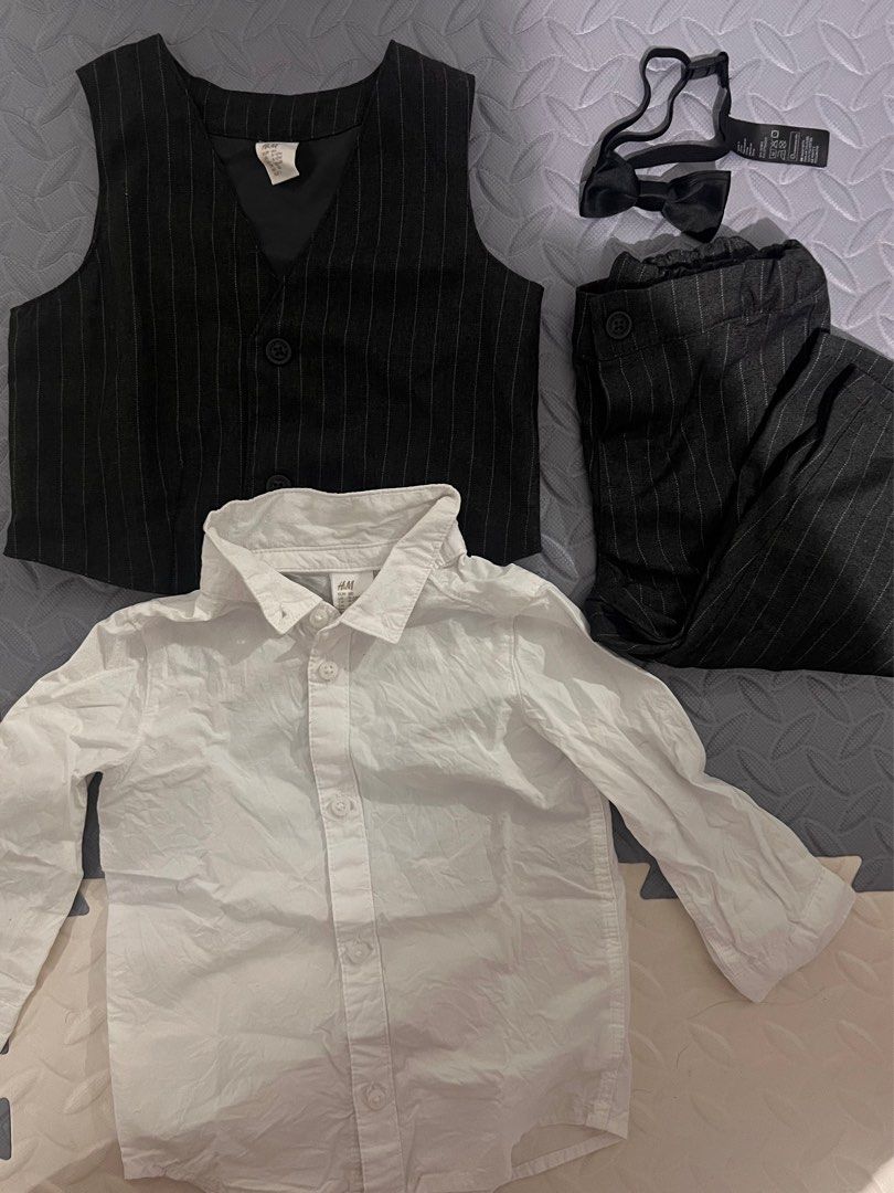 H&M 4 Piece Formal Set 9-12 months (Category: Babies & Kids Fashion) located in Marikina City. Submitted by itsjaneee (Listing ID 1410312066, Image 2). Description: H&M 4 piece formal set Includes: white button-down shirt, pinstripe vest, pinstripe pants, and black bow tie Pants feature an adjustable waistband Color: Dark Gray Used once .
