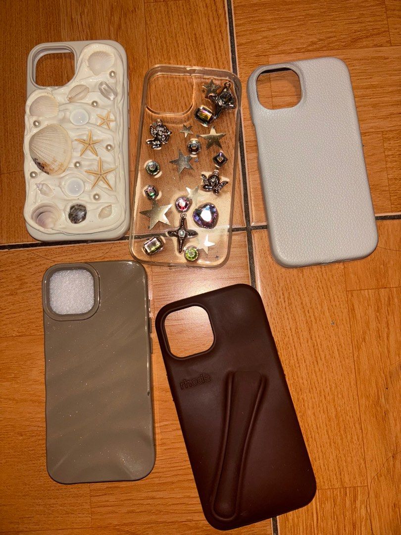 Iphone 15 Phone Cases (Category: Cases & Sleeves) located in Manila. Submitted by kreativelyph (Listing ID 1410355965, Image 1). Description: by order on pic slides: Brown - Php 100 Rhode Dupe - Php 150 Gray - Php 100 Gemstones Clear - Php 200 Seashell Case - Php 450 Get 5 cases for - Php 1000 .