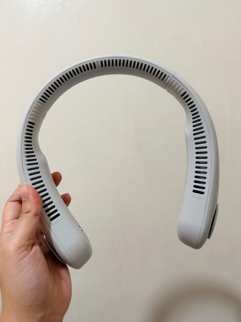JISULIFE Portable Neck Fan (Category: Fans) located in Mandaluyong City. Submitted by jozelle.soriano (Listing ID 1410235072, Image 1). Description: - Used only once JISULIFE neck fan - Hands-free and portable - Stylish white design - Comfortable curved neck design - Still in original packaging.