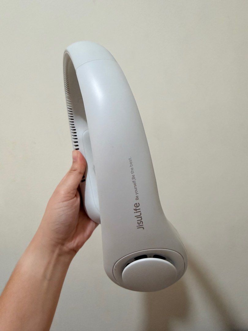JISULIFE Portable Neck Fan (Category: Fans) located in Mandaluyong City. Submitted by jozelle.soriano (Listing ID 1410235072, Image 3). Description: - Used only once JISULIFE neck fan - Hands-free and portable - Stylish white design - Comfortable curved neck design - Still in original packaging.