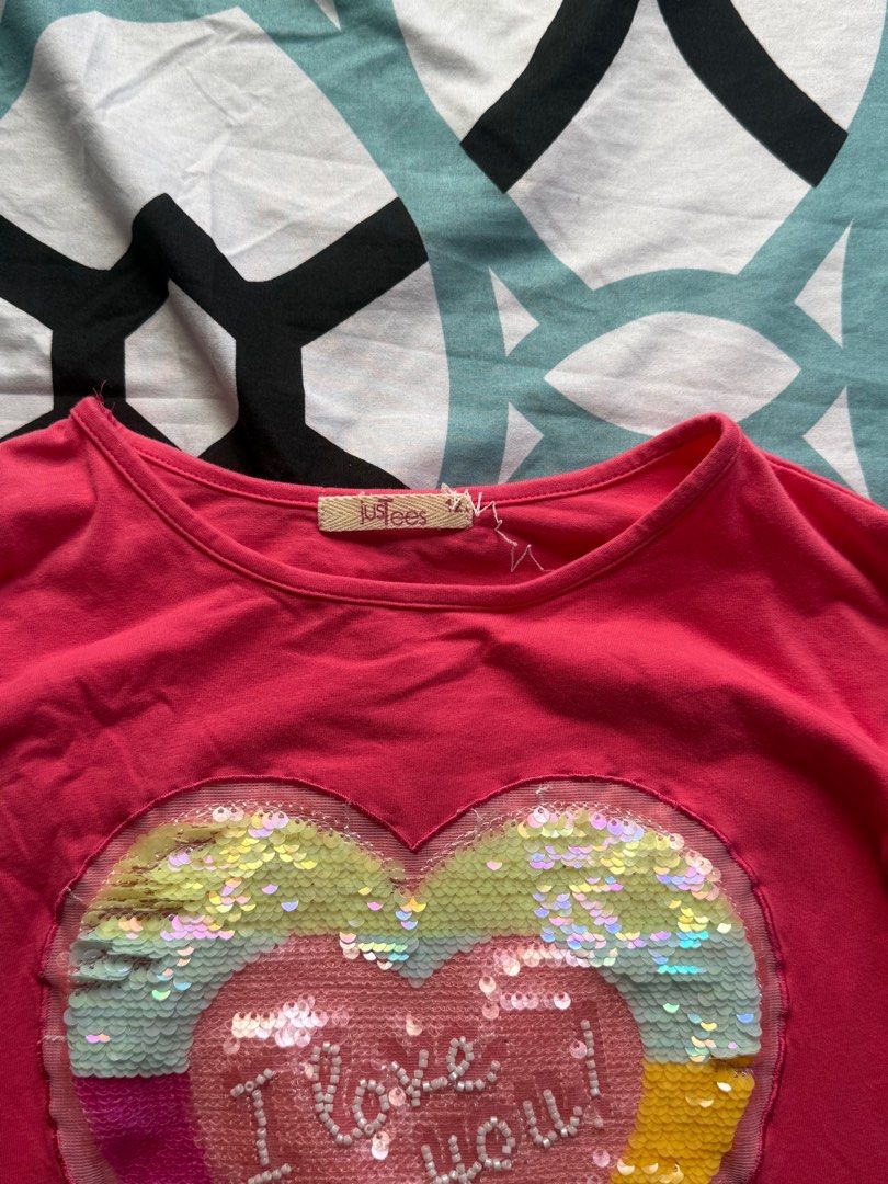 Just Tees Heart Sequin Long Sleeve Shirt (Category: Babies & Kids Fashion) located in Bacoor. Submitted by rizza_455 (Listing ID 1410192544, Image 2). Description: - Brand: Just Tees - Color: Pink - Design: Heart-shaped sequin with "I love you" text - Neckline: Round - Size: 12 fit to 5-7 yrs old.