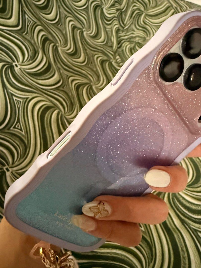 Kate Spade Iphone 17 promax case (Category: Cases & Sleeves) located in Tanay. Submitted by pinkyboocloset (Listing ID 1409999654, Image 3). Description: Bought it Dec 10, i thought it's pink. ☹️ with minimal dirt in the purple area - it can be removed by oil or baking soda.