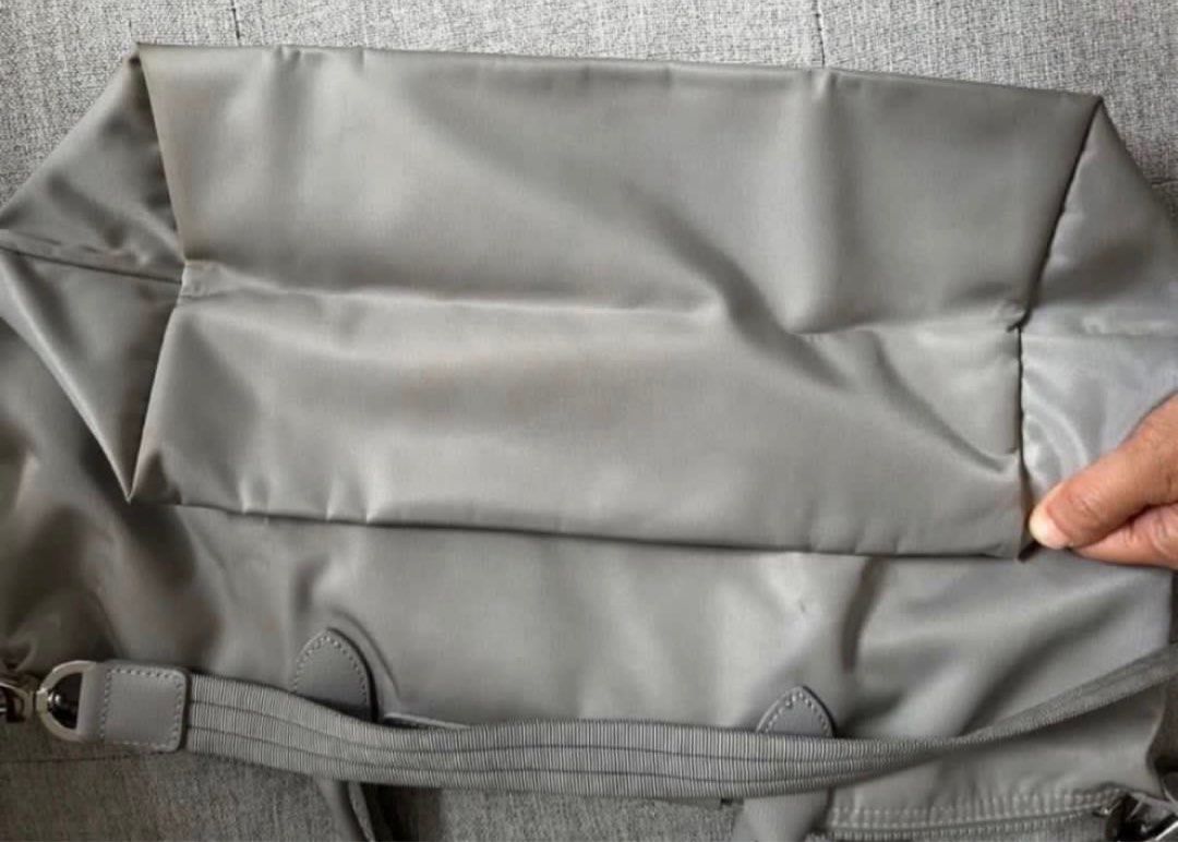 Longchamp Neo Pilage (Category: Luxury Bags & Wallets) located in Quezon City. Submitted by anneh13 (Listing ID 1410334944, Image 3). Description: Longchamp Neo Le Pliage Medium - fits 13 inch macbook Color gray Very good condition Only slight signs of wear No major flaws to note Made in Tunisia - bought in London Ships from Libis QC Firm on price - no lowballs .