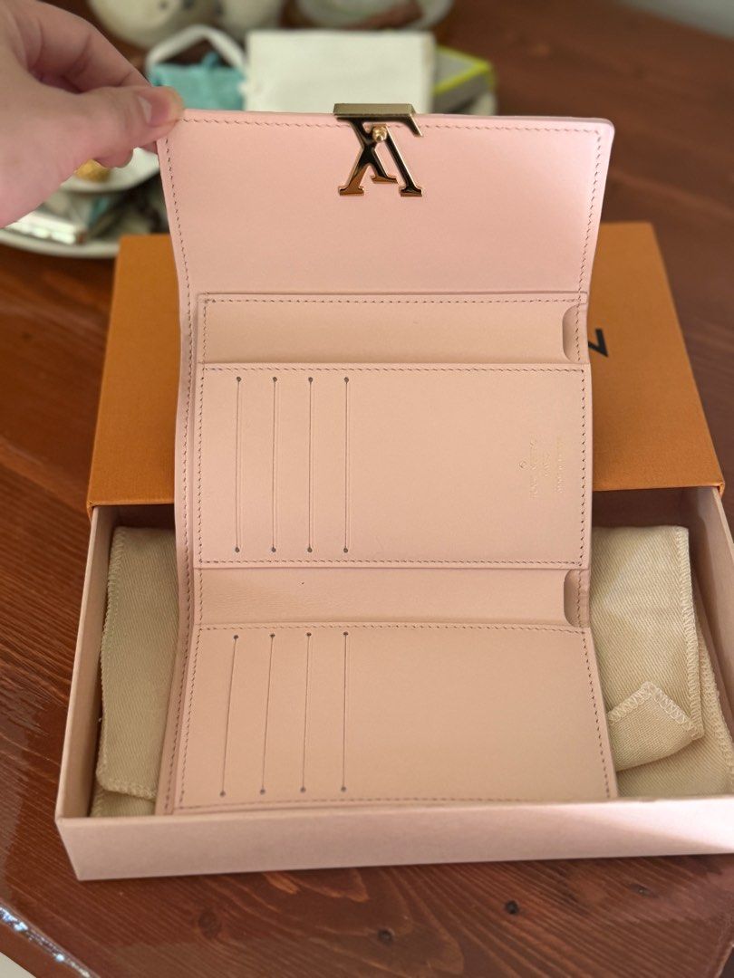 Louis Vuitton Capucines Compact Wallet (Category: Luxury Bags & Wallets) located in San Pablo. Submitted by _studioelaine (Listing ID 1410325741, Image 2). Description: LV Capuccine Compact Wallet Microchipped Color: Pink Jasmine Inclusions: Box Dustbag.