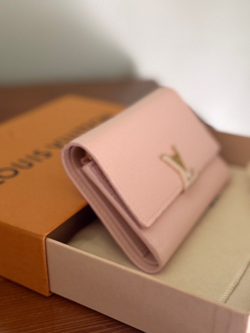 Louis Vuitton Capucines Compact Wallet (Category: Luxury Bags & Wallets) located in San Pablo. Submitted by _studioelaine (Listing ID 1410325741, Image 3). Description: LV Capuccine Compact Wallet Microchipped Color: Pink Jasmine Inclusions: Box Dustbag.