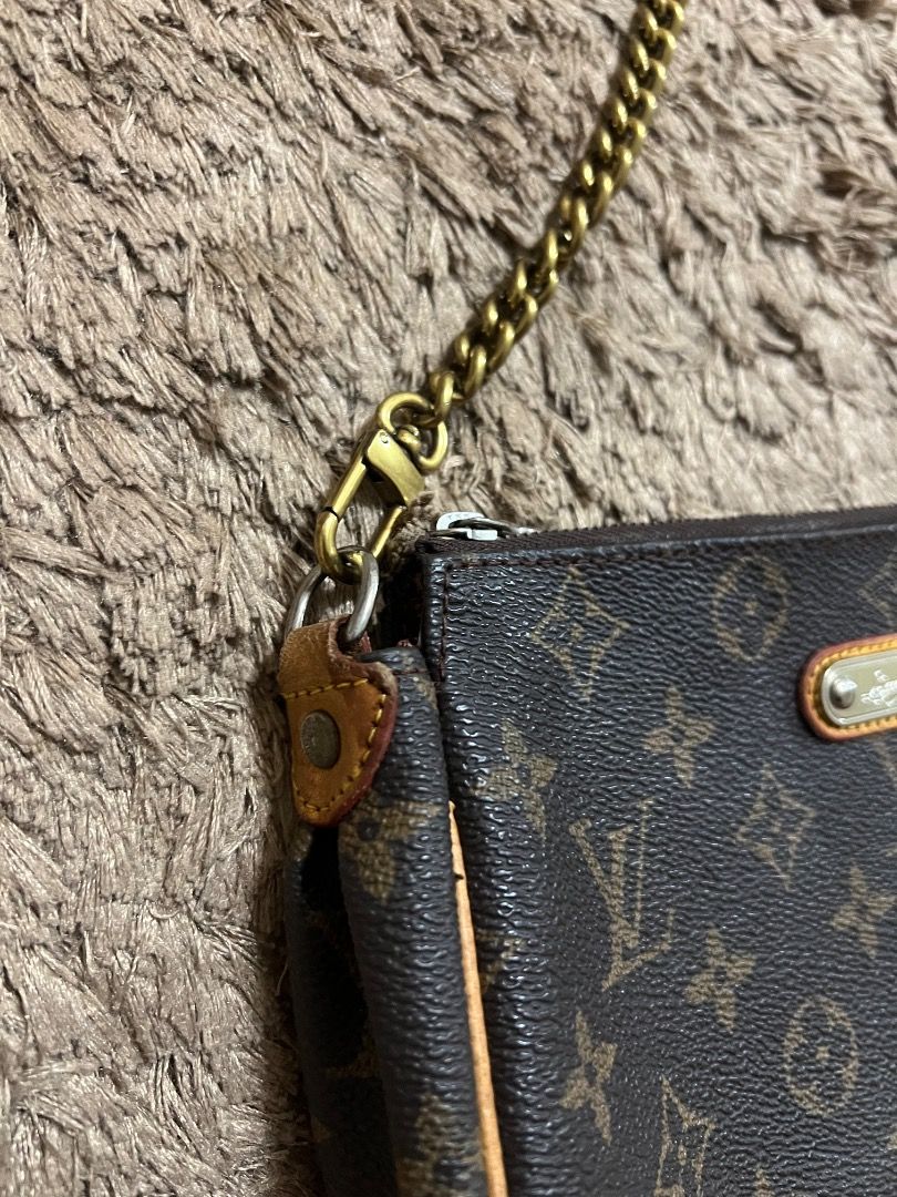 LOUIS VUITTON Monogram Crossbody Bag (Category: Luxury Bags & Wallets) located in Manila. Submitted by cluttercrushers (Listing ID 1410197738, Image 3). Description: Louis Vuitton Monogram Eva Pochette Up for sale is a well-loved Louis Vuitton Monogram Eva Crossbody Pochette. • stylish and versatile bag features the iconic monogram pattern. Please note that the chain is a non-original replacement that I purchased online. Condition : Used, with ty