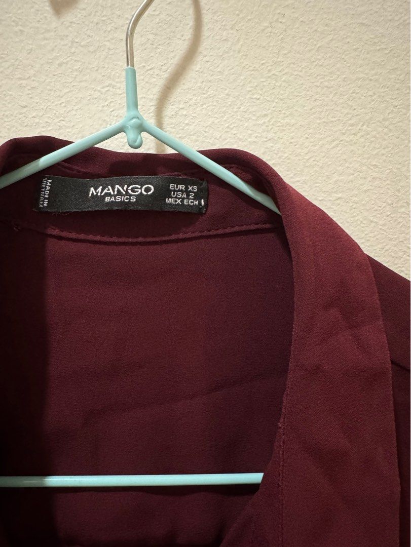 Mango Basics Burgundy Blouse (Category: Blouses) located in Makati City. Submitted by annadelarama (Listing ID 1410273923, Image 2). Description: Mango Burgundy Blouse. Lightly used but still in great condition! Love the sleeves of this. Perfect for the office or special occasions. Size: US 2, XS RFS: Decluttering.