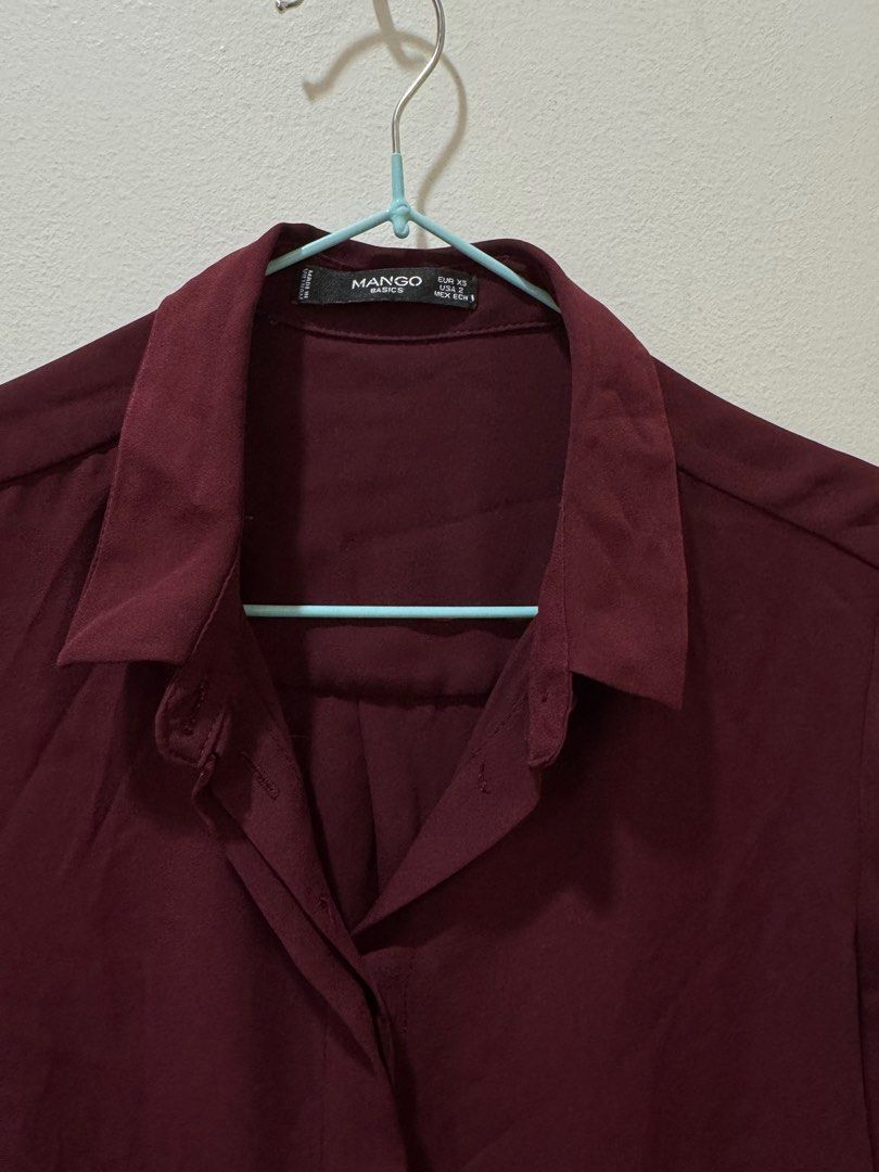 Mango Basics Burgundy Blouse (Category: Blouses) located in Makati City. Submitted by annadelarama (Listing ID 1410273923, Image 3). Description: Mango Burgundy Blouse. Lightly used but still in great condition! Love the sleeves of this. Perfect for the office or special occasions. Size: US 2, XS RFS: Decluttering.