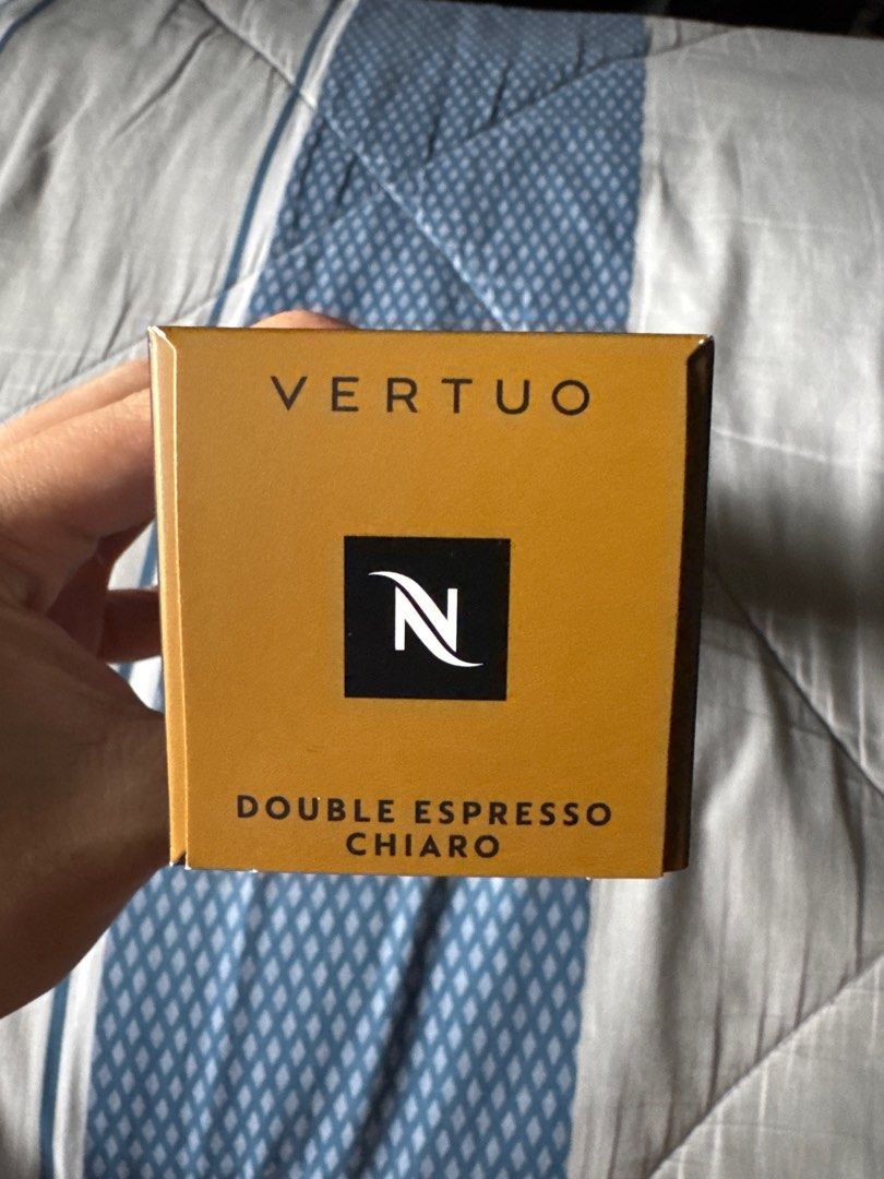 Nespresso Vertuo Double Espresso Chiaro Capsules (Category: Coffee Machines & Makers) located in Manila. Submitted by patrickneil09 (Listing ID 1410235252, Image 2). Description: Nespresso Vertuo Double Espresso Chiaro coffee capsules. The box indicates it is for the Vertuo system. The box contains 100g of coffee. The capsules are designed for double espresso. The box is black with the Nespresso logo. The box is unopened..