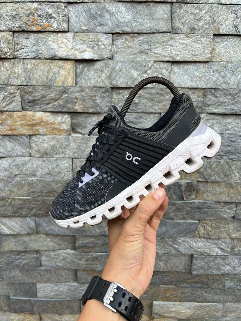 On Cloud Black Running Shoes size 5.5-6 (Category: Sneakers) located in Bacolod City. Submitted by novymaesel14868 (Listing ID 1410307024, Image 2). Description: - On Cloud running shoes - Color: Black - Size: US W6, EUR 37, UK 4 - Breathable mesh upper - CloudTec sole for cushioning - Lace-up closure - Brand logo visible - Soles show some wear.