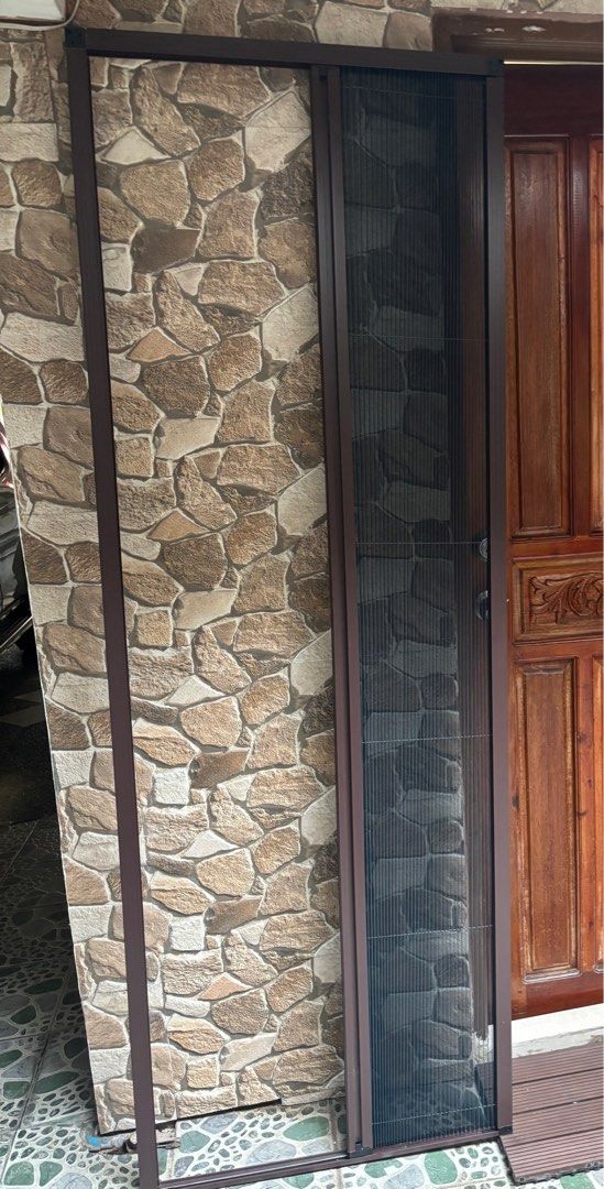 Pleated screen Door mesh (Category: Other Home Furniture) located in Makati City. Submitted by jlocka (Listing ID 1410269490, Image 3). Description: - Pleated door screen - Brown frame - Fine mesh screen - Brand new - Installed on door frame - Approximately 76 inches high - Approximately 27 inches wide - Actual size on photos -RFS: nagkamali ng sukat .