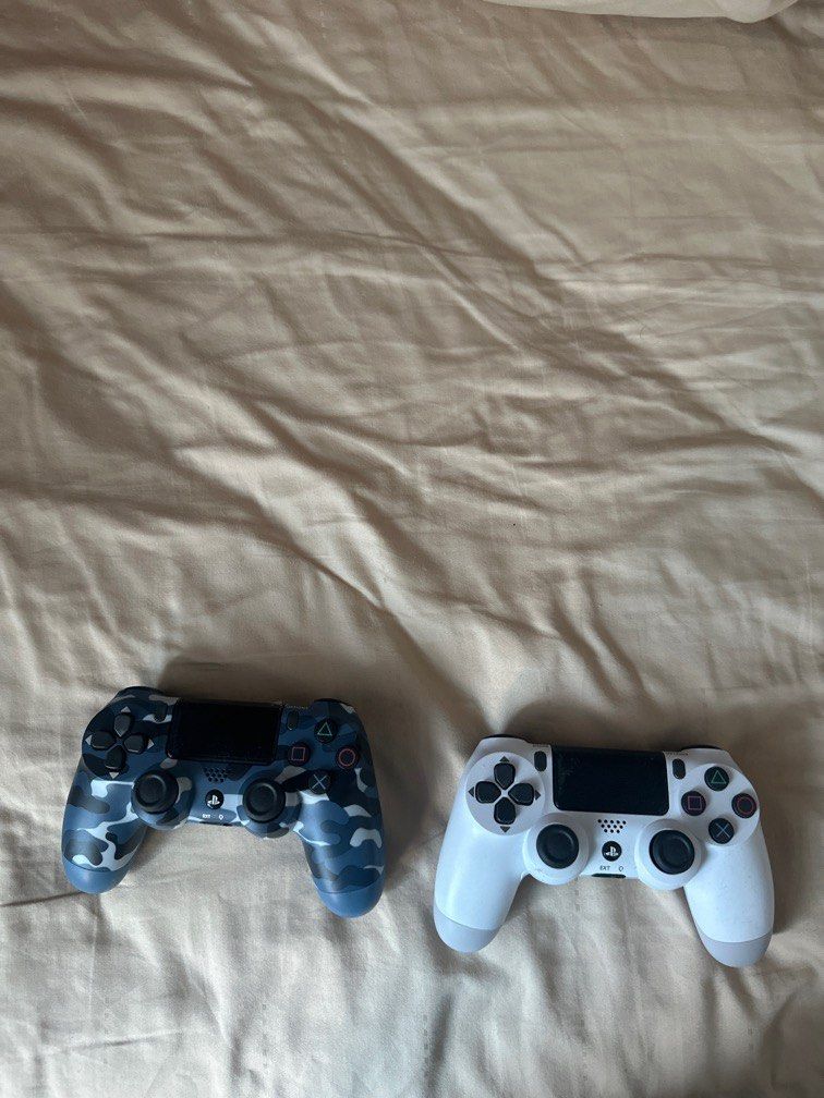 PS4 Controller (Category: Controllers) located in Singapore. Submitted by snowmannnnn (Listing ID 1410247774, Image 1). Description: Sold as a pair, priced individually.