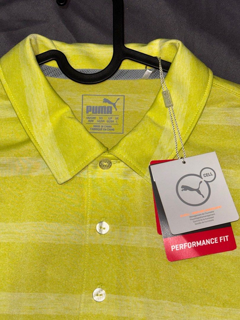 Puma Performance Fit Polo Shirt - Size L (Category: Tshirts & Polo Shirts ) located in Makati City. Submitted by nik0535 (Listing ID 1410309451, Image 1). Description: - Bright yellow Puma polo shirt - Horizontal stripes - Collared neckline - Short sleeves - Puma logo on chest and sleeve - Performance Fit - Size: L Mode of payment: Gcash/bank transfer Mode of shipping: lalamove/angkas (shouldered by buyer).