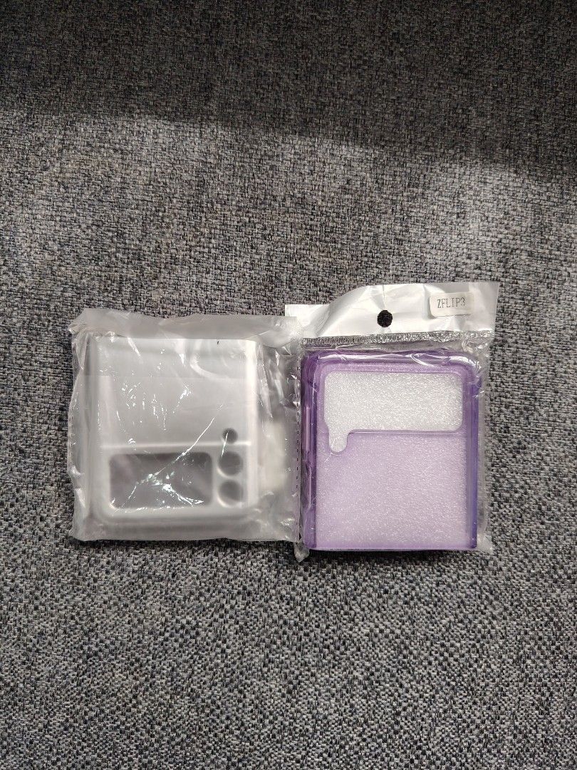 Samsing Z Flip 3 Assorted Cases (Category: Cases & Sleeves) located in Pasig City. Submitted by ciarascloset (Listing ID 1410198532, Image 2). Description: Get all for 500 You get the ff 1. Plain purple magnetic case 2. Animal Print magnetic case 3. Transparentl purple case 4. Silver Case.