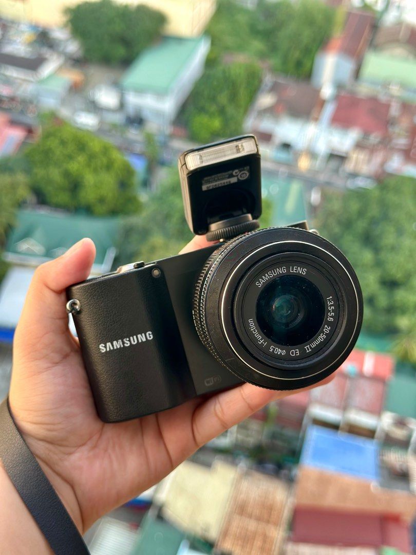 Samsung NX 1000 (Category: Cameras) located in Quezon. Submitted by rinatsky (Listing ID 1410191988, Image 1). Description: SAMSUNG NX 1000 PHP 10,499 - 20.3 mega pixels - Wifi and NFC + 1080p HD movie recording - best features: retro effect, soft focus, vivid, portrait, clasic effect, and custom rgb effect - more features: old film effect, half tone, night mode, sunset mode, beach mode, forest, & many more vintage outputs - white balance is also