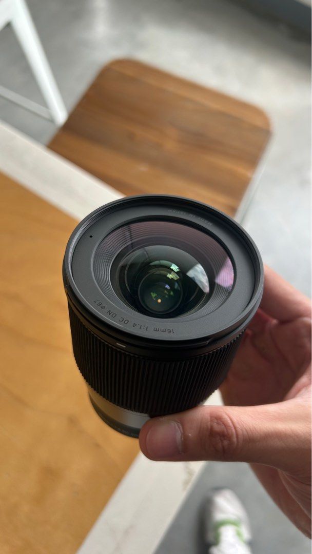 Sigma 16mm f/1.4 DC DN Lens E-Mount Sony APSC (Category: Lens & Kits) located in Manila. Submitted by tsukkisell (Listing ID 1410297828, Image 3). Description: Details: * Sigma 16mm f/1.4 DC DN Contemporary * For APS-C mirrorless cameras (Sony E-mount) * Includes front and rear caps + lens hood * Comes with original box * Glass and body in excellent condition * Smooth focus ring, clean contacts Condition: * In great condition, like mint condition