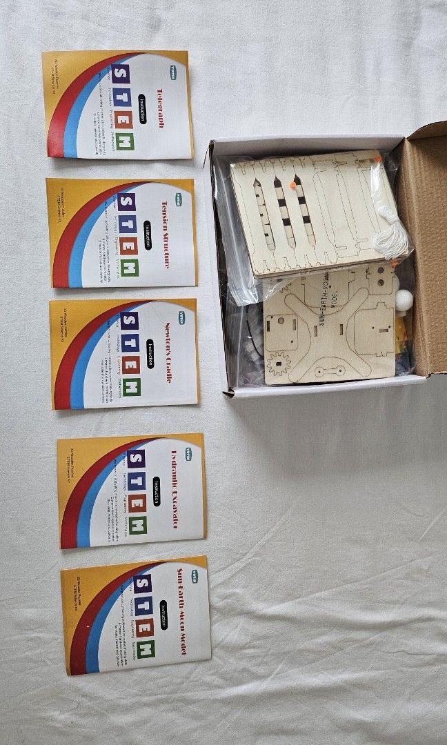 STEM kits (Category: Educational & Learning Toys) located in Singapore. Submitted by jhansfor (Listing ID 1410188796, Image 3). Description: STEM sets to build various circuit boards, never used but box has been opened..