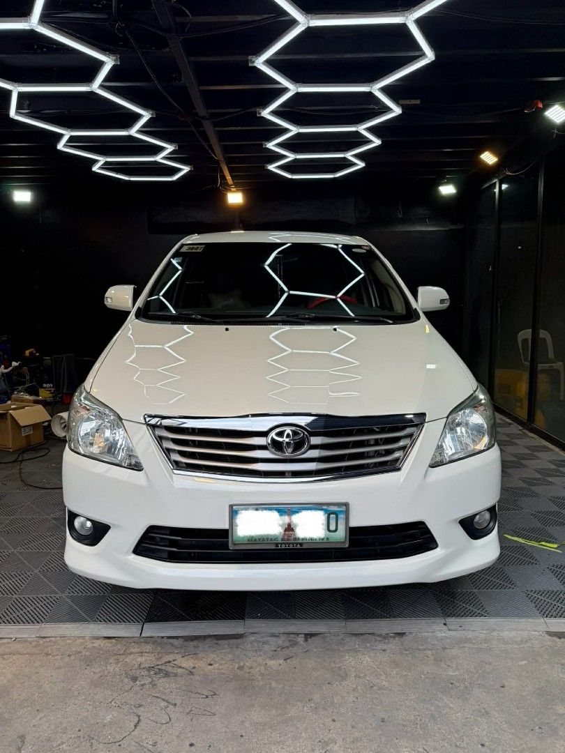 Toyota Innova (Category: Used Cars) located in Manila. Submitted by tmbalicanta (Listing ID 1407886891, Image 1). Description: 🚗 2014 Toyota Innova 2.0 G AT (Gas) 💰 ₱530,000 (Negotiable) 📍 Quezon City ✅ First-owner | 60k+ km | 7-seater | Automatic ✨ Upgraded LCD w/ reverse cam, dashcam, fog lamps, stepboard, rain visors, rear spoiler 📌 Minor cosmetic issues only, fully functional 🚫 No swap / No trade 📩 Direct buyers only – PM to schedule vi