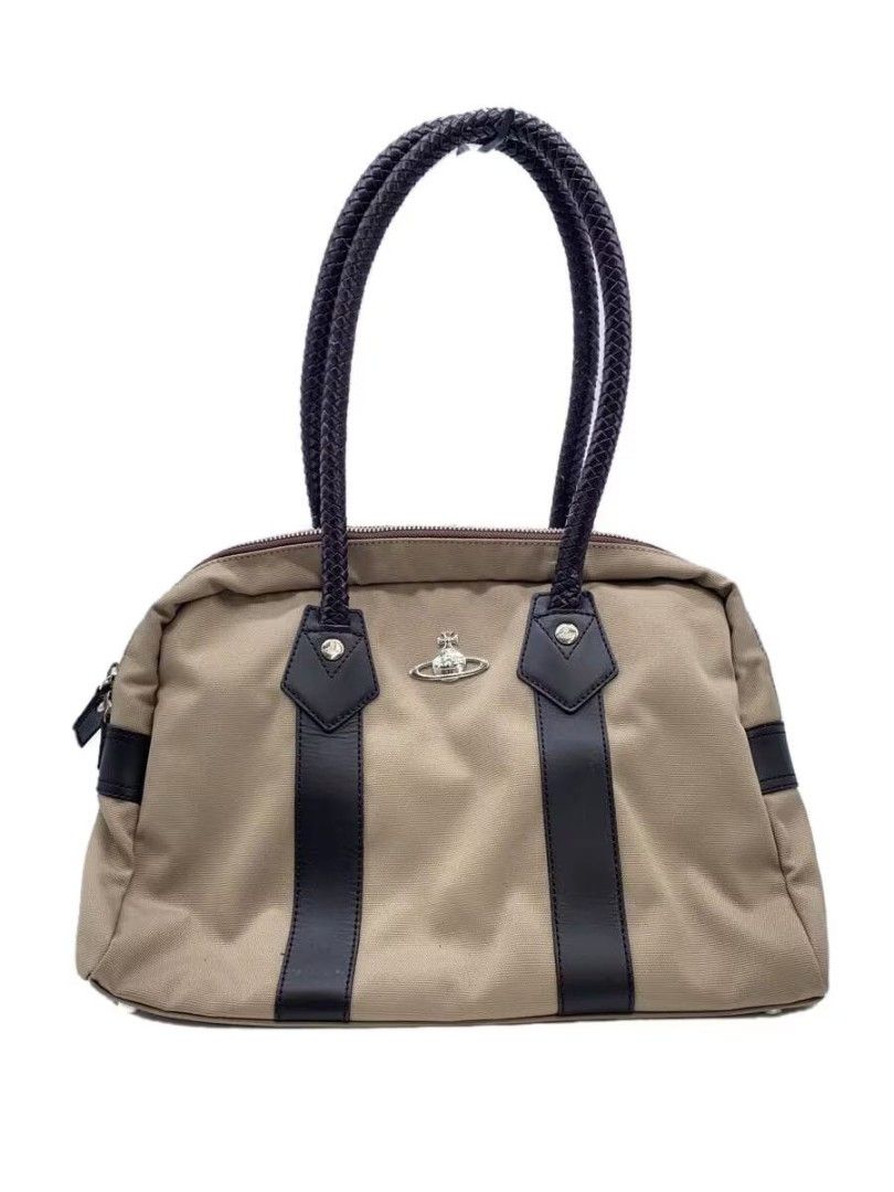 Vivienne Westwood Handbag (Category: Luxury Bags & Wallets) located in Davao. Submitted by dollettella (Listing ID 1410338661, Image 1). Description: FLAWS: BAKBAK HANDLE. OVER GOOD..
