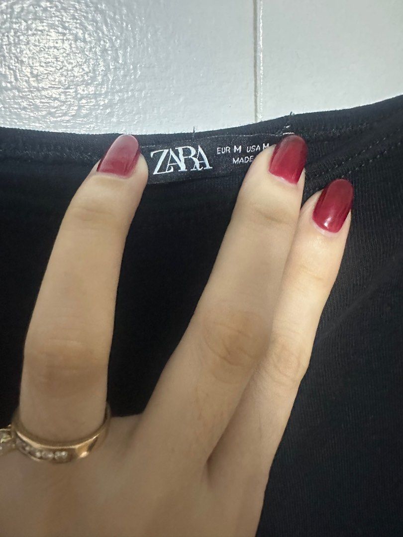 Zara Black Long Sleeve Top (Category: Longsleeves) located in Taguig. Submitted by rlg.declutterph (Listing ID 1410260176, Image 3). Description: - Zara long sleeve top - Color: Black - Neckline: offshie - Size: M - Material: Knit - Design: Simple, classic - Origin: Made in Morocco Paperbag included .