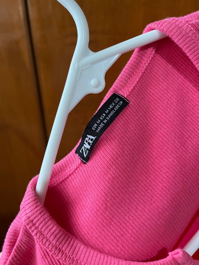 Zara Ribbed Crop Top (Category: Sleeveless) located in Rizal. Submitted by bubbles_1313 (Listing ID 1410257180, Image 3). Description: rfs: DECLUTTERING!! - crop top - Vibrant pink color - Ribbed texture - V-neck design - Short sleeves - Size M on tag - bought from orange app.