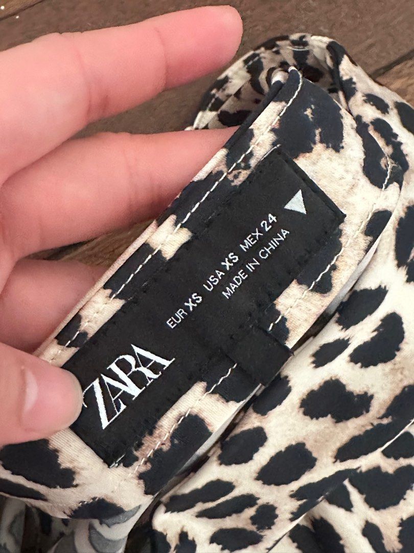 Zara satin leopard print midi skirt (Category: Skirts) located in Quezon City. Submitted by celoem (Listing ID 1410200692, Image 2). Description: New w/o tags and laundered. Can fit S to semi M.